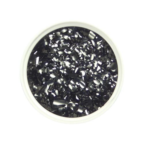 Edible glitter flakes black close up