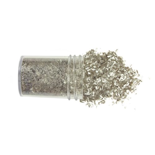 Edible glitter flakes silver close up with pot